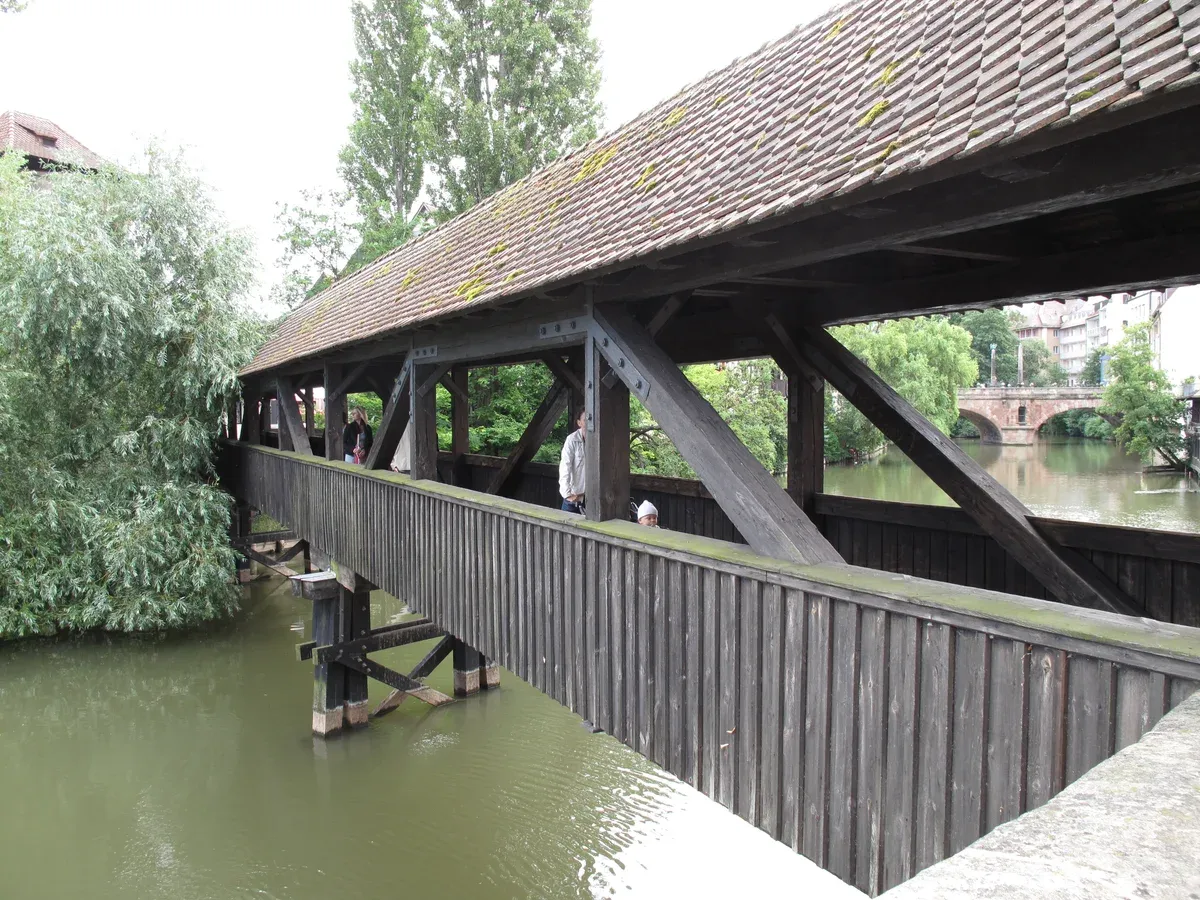 The covered wooden Hangman's Bridge over the Pegnitz river in Nuremberg